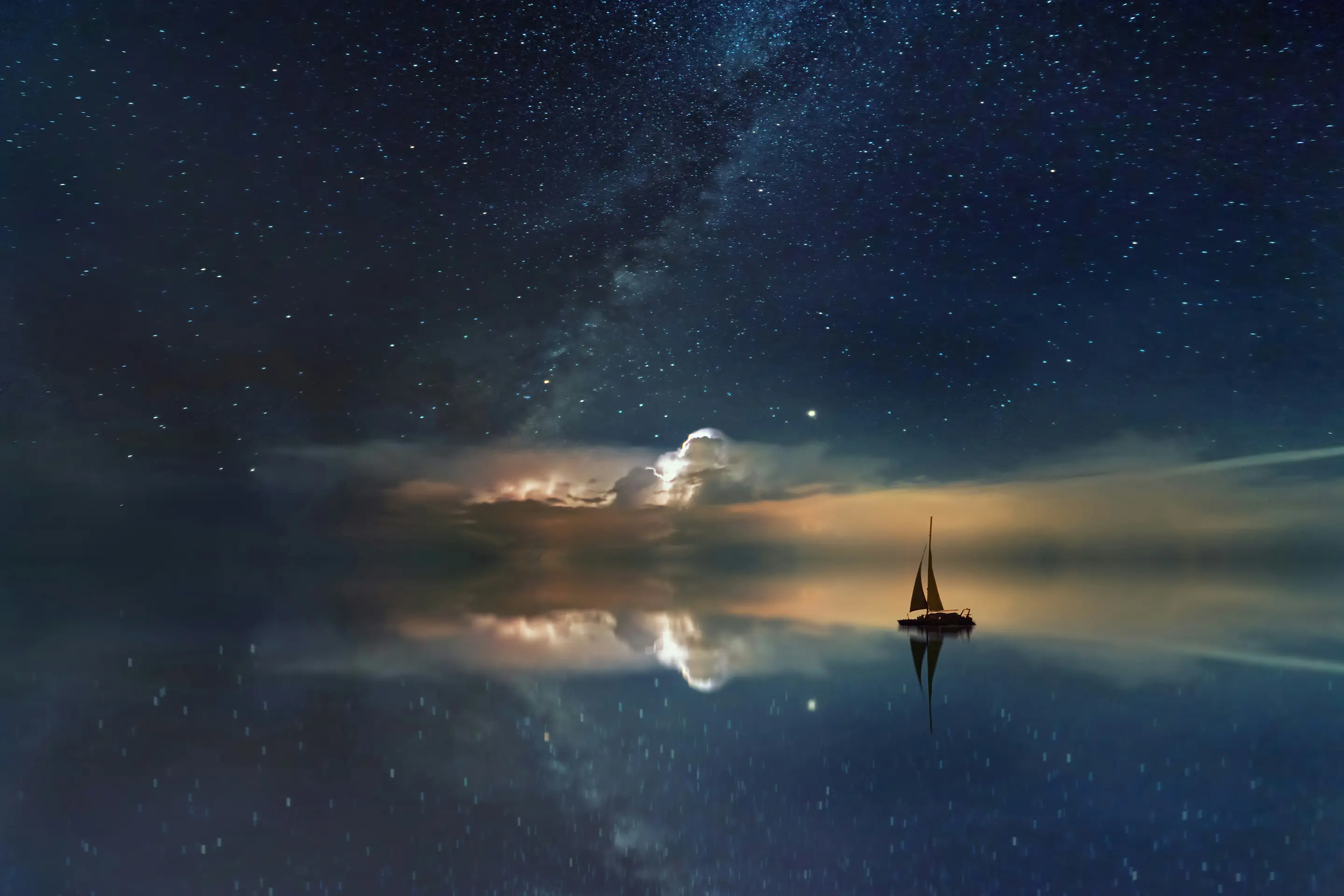 Boat on the sea with dramatic sky. Photo by Johannes Plenio on Unsplash.